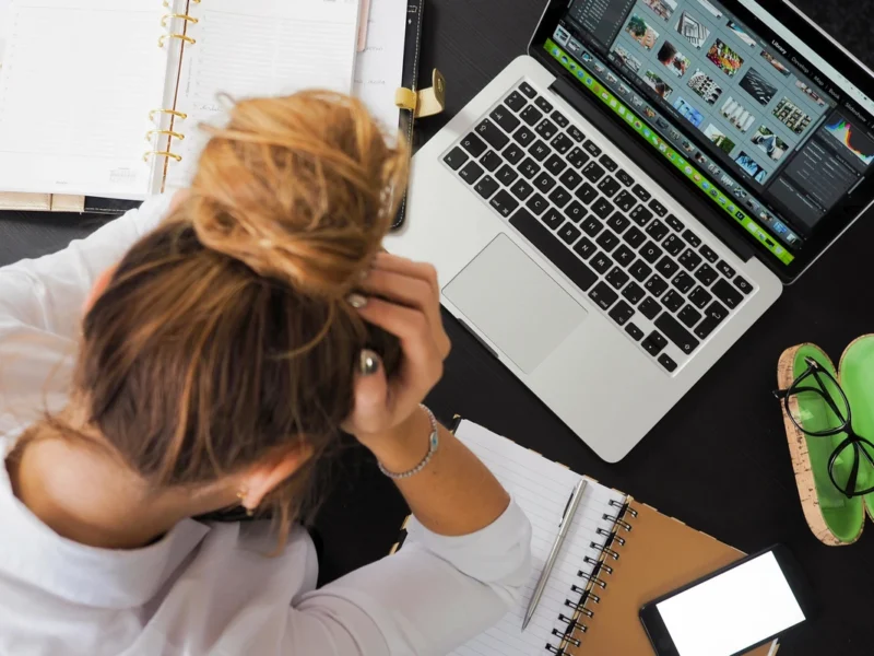 a female experiencing frustration at her lack of productivity